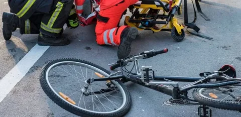 a crashed bicycle after an accident on the road